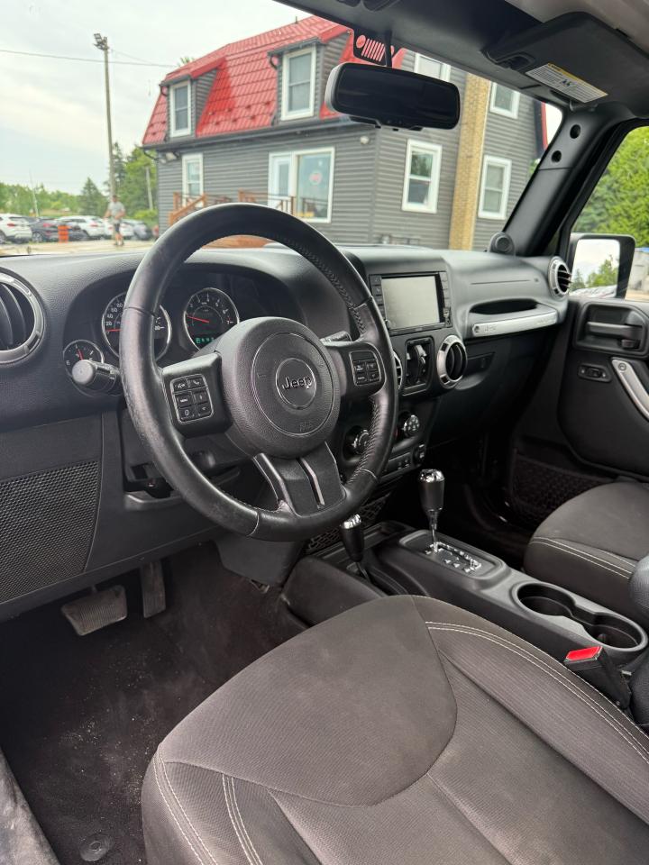 2014 Jeep Wrangler Sahara Photo14