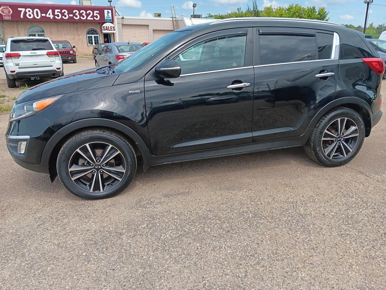 2016 Kia Sportage SX Luxury AWD, Htd Seats, BU Cam, Park Assist, - Photo #4