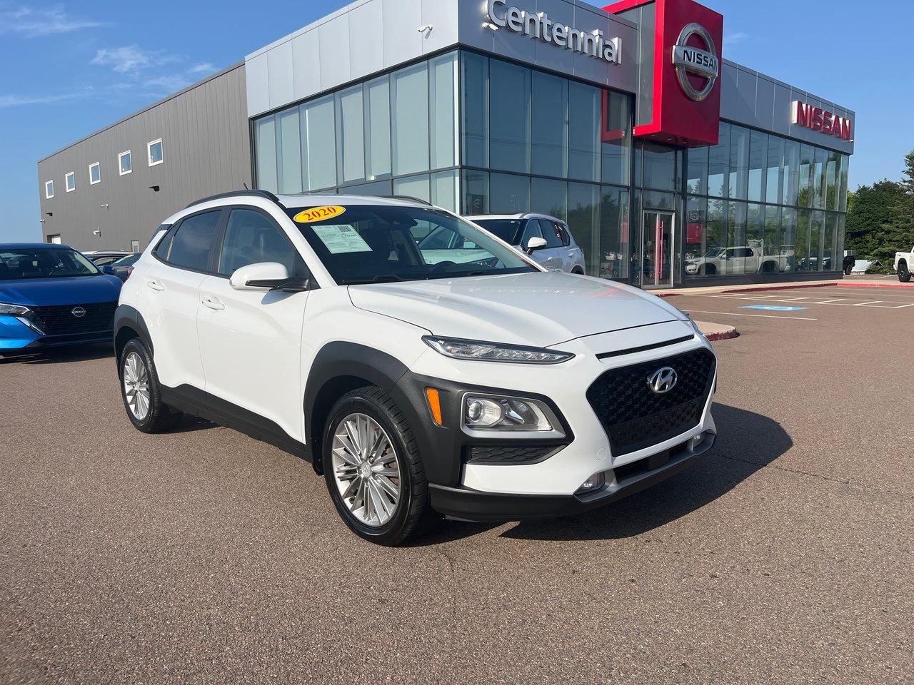 <span>This 2020 Hyundai Kona Electric offers quick acceleration thanks to instant-on electric torque and all kinds of other new perks. At current electricity rates, the 2020 Kona Electric in top-spec Ultimate trim, with 415 kilometres of range, should cost less than $10.00 for a full at-home charge. </span>

<span> </span>

<span>The Kona Electric Ultimate includes standard kit such as Apple CarPlay/Android Auto on a big infotainment touchscreen, proximity access/pushbutton start, automatic climate control, and lane keeping assist. The list of extras is lengthy: blind spot monitoring, heated front seats and steering wheel, adaptive cruise control, and the very helpful EV heat pump.</span>




<span>But its the Kona Ultimates extras that will really grab your attention: leather seating, a 10.25-inch screen with navigation, head-up display, ventilated front seats, sunroof, LED headlights with active cornering, rain-sensing wipers, and auto high beams.</span>




<span style=font-weight: 400;>Thank you for your interest in this vehicle. Its located at Centennial Nissan, 264 Pope Road, Summerside, PEI. We look forward to hearing from you; call us toll-free at 1-902-436-9159.</span>