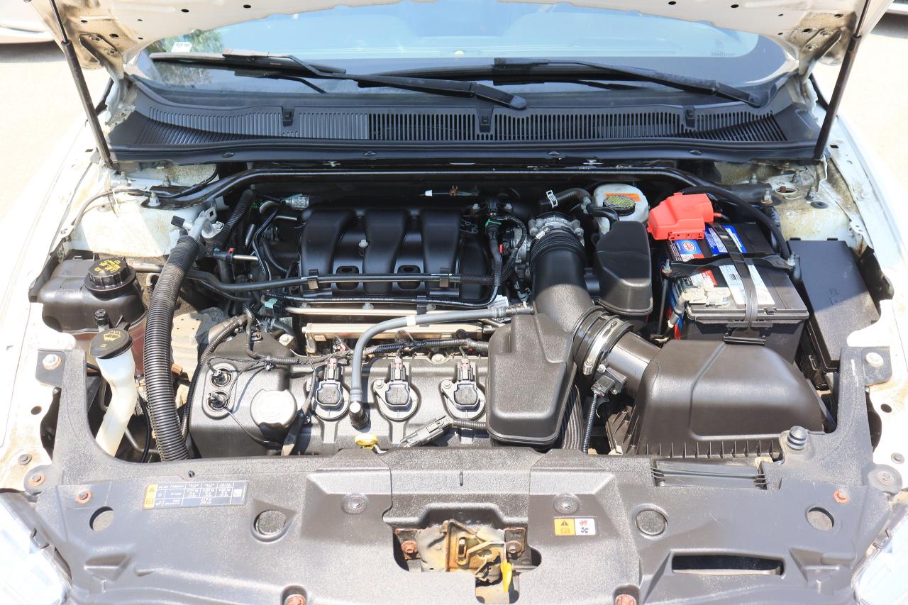 2015 Ford Taurus Limited | AWD | Leather | Roof | Nav | Cam | BSM++ Photo