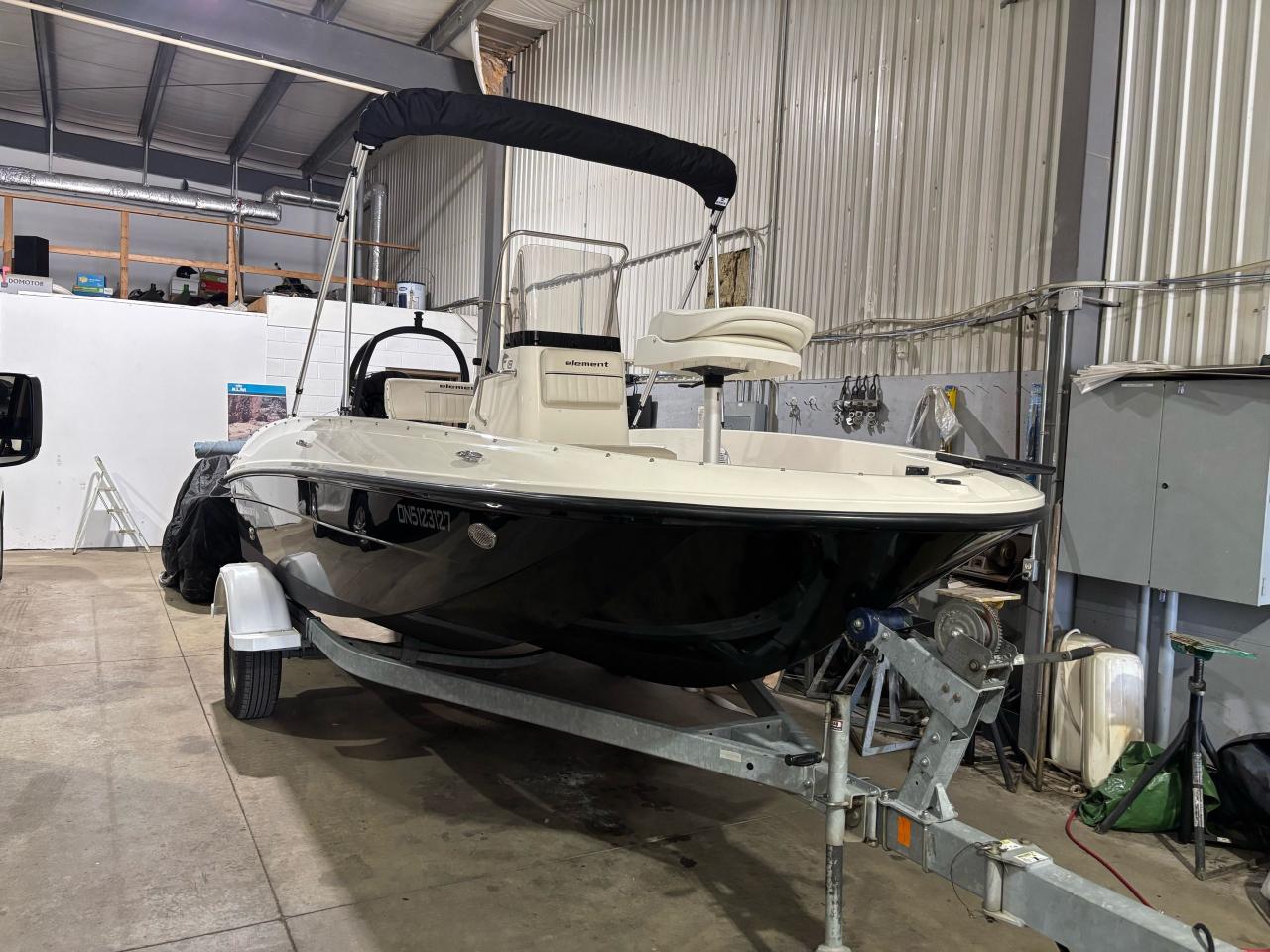 2016 Bayliner Element F18 center console - Photo #16