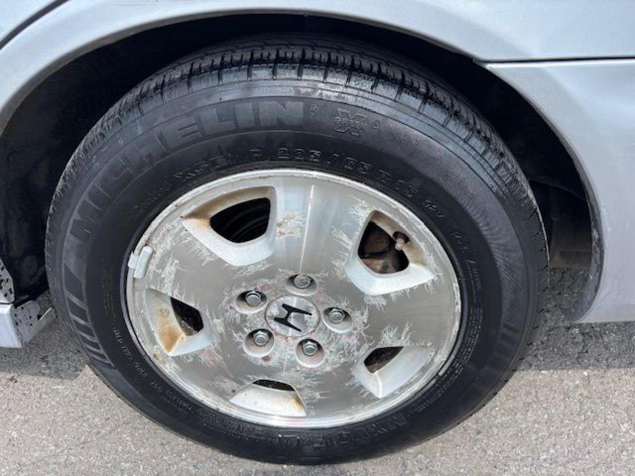 12677817