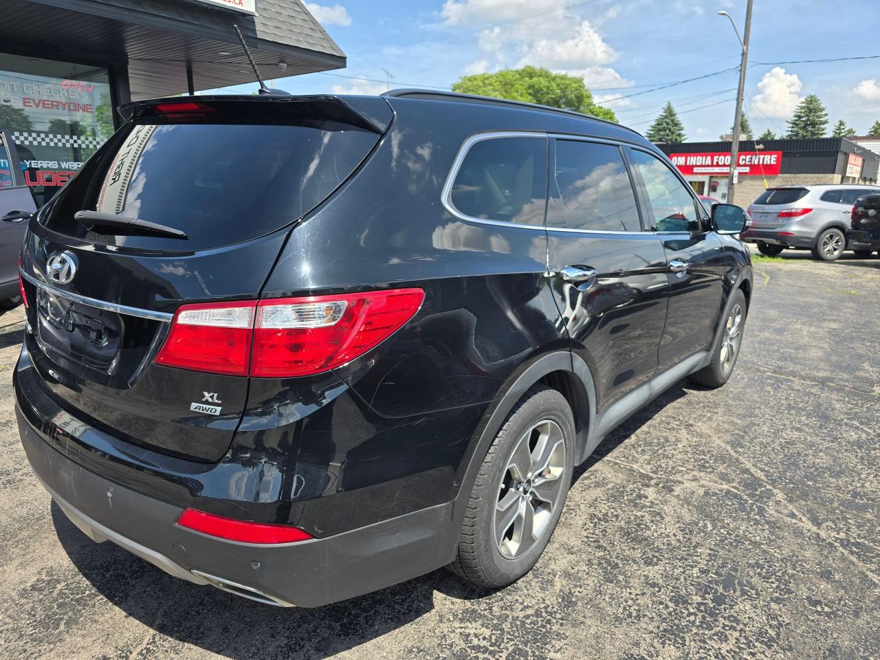 2015 Hyundai Santa Fe XL AWD 4dr 3.3L Auto Luxury - Photo #4
