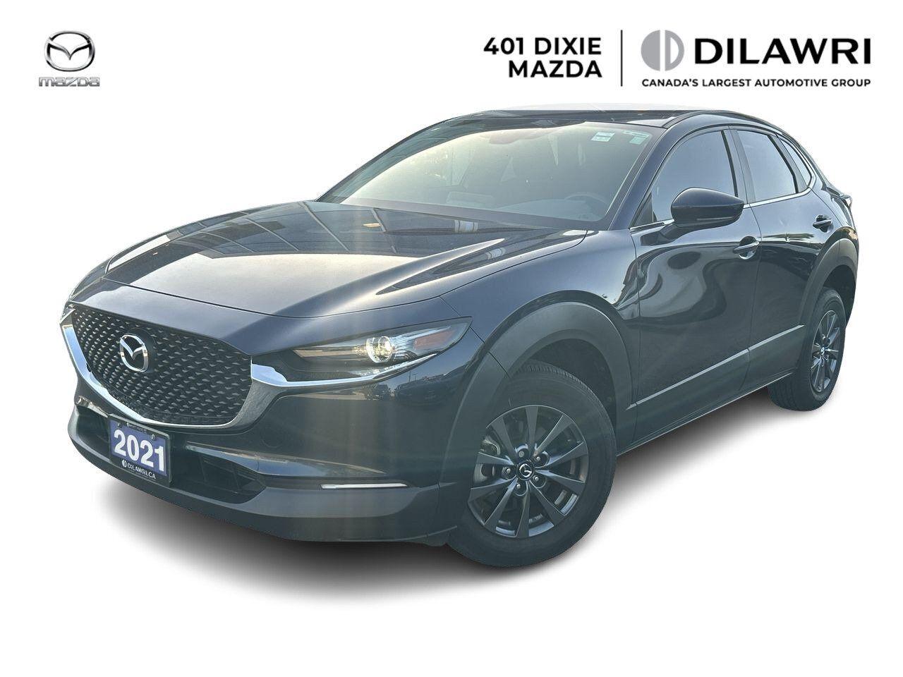 2021 Mazda CX-30 GX – a versatile, fuel-efficient, and stylish subcompact SUV that offers an engaging drive and modern features. Powered by a 2.0L Skyactiv-G 4-cylinder engine paired with a 6-speed automatic transmission, this front-wheel-drive model delivers smooth performance and excellent handling. The GX trim comes well-equipped with an 8.8-inch infotainment display with Mazda Connect, Apple CarPlay and Android Auto, Bluetooth, a rearview camera, push-button start, keyless entry, and advanced safety features like Smart City Brake Support and lane departure warning. With its upscale interior, bold exterior design, and impressive ride quality, the 2021 CX-30 GX is perfect for city driving or weekend getaways. Clean, reliable, and ready for the road!



___________________________________________________________________________________________________________

Experience worry-free car ownership when you purchase a Dilawri Certified Pre-Owned Vehicle from 401 Dixie Mazda, you will be entitled to exclusive benefits such as...

105 point safety and quality inspection.

Inspected and serviced by factory-trained technicians.

3 days or 300km exchange policy **

Powertrain Warranty 90 days or 3000km**

Complimentary roadside assistance for 1 year up to 50kms 

___________________________________________________________________________________________________________

401 Dixie Mazda has been proudly serving in Mississauga, Brampton, Oakville, Milton, Burlington, Hamilton, Guelph, Kitchener, Waterloo, Newmarket, Aurora, Barrie, Scarborough, Markham, Richmond hill, Toronto, Ajax, Pickering, Oshawa and Windsor through the Dilawri Group. No hidden costs or fees.

___________________________________________________________________________________________________________

Privately owned and operated by the Dilawri family since 1985, Dilawri continues to build on a history of excellence as Canadas largest automotive group. The companys network represents 37 of the worlds most beloved automotive brands at 80 franchised dealerships in Canada and the US. Dilawri is a 2023 winner of the Canadas Best Managed Companies program, which recognizes excellence in private Canadian-owned companies.


Dilawri is proud to offer exceptional products and services, delivered by our more than 3,500 employees. We are committed to leadership in business as well as in the communities we serve. Since 2002, the Dilawri Foundation has contributed millions of dollars to a wide range of charitable causes.


While we make every effort to provide you with two keys for all our pre-owned vehicles. However, unless otherwise specified in your purchase agreement.


Price online reflects a $1000 Finance Credit applied. Cash Price will differ.