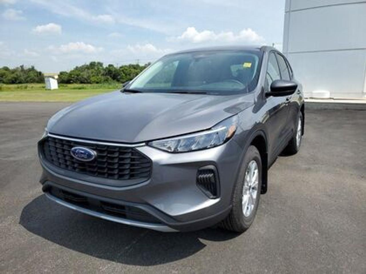 This all-new 2025 Escape Active 200A looks absolutely stunning in Carbonized Gray Metallic. This 5-passenger All-wheel drive crossover comes equipped with the 1.5L EcoBoost® engine. This remarkable engine not only produces 181 horsepower and 190 ft-lbs of torque, but by leveraging EcoBoost® technology and an 8-speed automatic transmission, this crossover is rated to get an estimated 8.4L/100km (34 miles per gallon) combined highway/city fuel economy.

Key Features:
8 Instrument panel cluster
 All-wheel drive
Ford Co-Pilot360
Heated Front Seats
Remote Start
Heated Mirrors
SYNC® 4 W/8 LCD Capacitive Touchscreen
Wireless Apple CarPlay® and Android Auto Compatibility
Privacy Glass
17 Shadow Silver Painted Aluminum Wheels
Power Windows
LED Taillamps
LED Headlamps
FordPass Connect
Mini Spare Wheel/Tire

Moose Jaw Ford, conveniently located at 1010 North Service Road in Moose Jaw, is your trusted destination for all your automotive needs. With an impressive 4.8-star Google rating from nearly 1,500 reviews, we are proud to deliver an exceptional vehicle-buying experience tailored just for you. Our Moose Jaw Motives set us apart, offering unbeatable value like half-priced oil changes for life on pre-owned vehicles, one year of key and remote protection, and one year of tire and rim protection. Enjoy peace of mind with every purchase. At Moose Jaw Ford, were committed to driving positive change in our community by combining exceptional service, high-quality vehicles, and a guest-first approach. Visit us today!