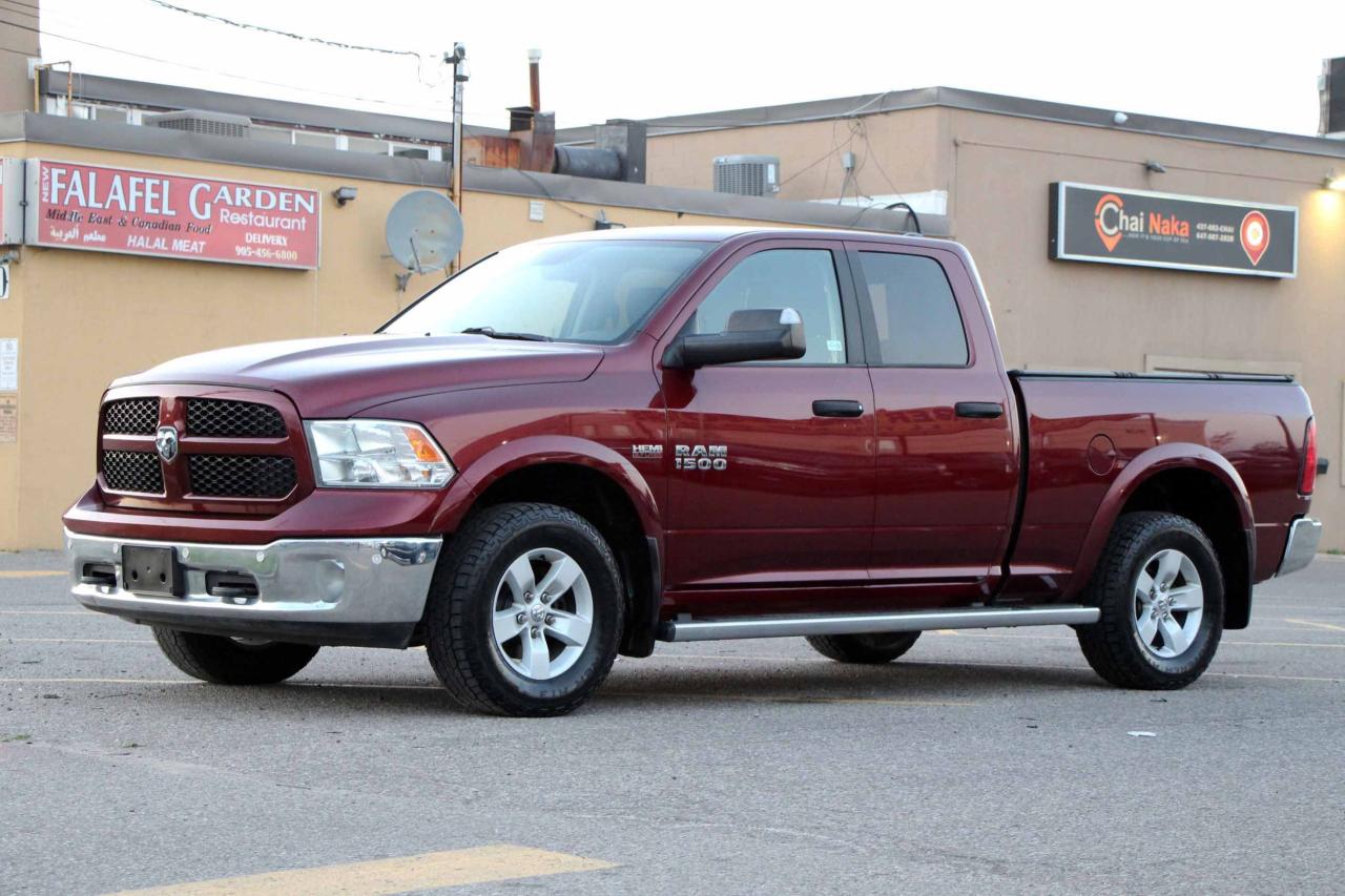 2017 RAM 1500 4WD Quad Cab 140.5" Outdoorsman Photo2