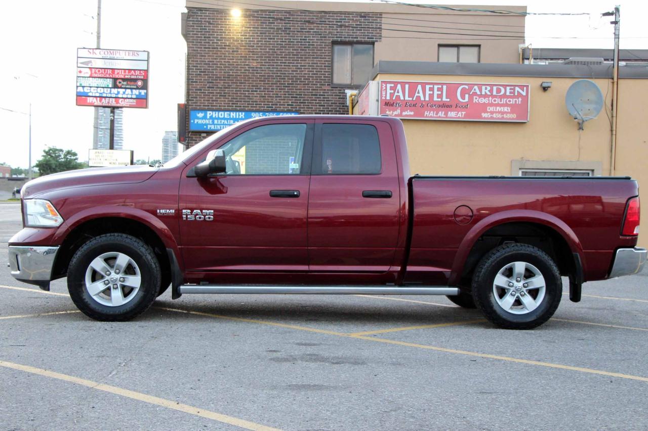 2017 RAM 1500 4WD Quad Cab 140.5" Outdoorsman - Photo #4