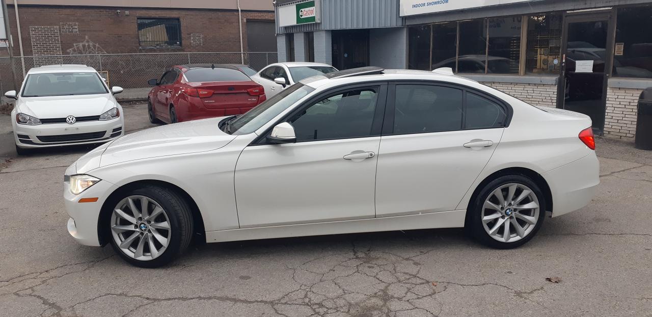 2013 BMW 3 Series 4dr Sdn 320i xDrive AWD - Photo #2