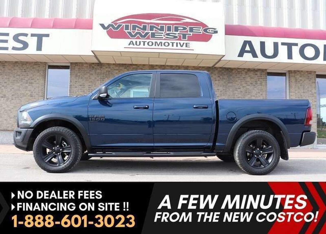 *** Dealer arranged financing on site! Quick, Simple,  no calls or waiting on bank appointments required!! Drive away today ***   NO ADMINISTRATION FEES!! STUNNING AND LOADED 2022 RAM 1500 CREW CAB WARLOCK EDITION , HUGE VALUE - YOU SAVE OVER $2O,000 FROM NEW MRSP & THIS TRUCK SHOWS LIKE NEW IN ALL RESPECTS WITH LOW WELL CARED FOR KMS. VERY WELL EQUIPPED 2022 RAM 1500 CLASSIC CREW CAB WARLOCK NIGHT EDITION 4X4, GREAT LOOKS, LOADED WITH OPTIONS, EXRTA CLEAN AND WELL LOOKED AFTER!  <h5>Features</h5> - 3.6L Pentastar VVT V6 engine (producing 305 hp) - 8 Speed automatic  - Auto 4X4 with 2 stage transfer case  - Antispin differential rear axle WITH 3.55 rear axle ratio - Rear heavyduty shock absorbers - Transfer case skid plate - Front suspension skid plate - Hard to find WARLOCK Night Edition Equipment Group  - 5 Passenger power Bucket seating with Full large center console - Heated seats and steering wheel - 8.4" touchscreen multi-media system - Premium Audio with Satellite input - Media hub with multi-USB and AUX input  - Google Android Auto and Apple Cap Play - Back up Camera - Dual zone auto climate control - 115volt auxiliary power outlet - Power lumbar adjust - Security alarm - Leather wrapped steering wheel with mounted audio controls - Remote start system - 7inch color incluster display - Technology Package with Pushbutton start and Remote proximity keyless entry - Factory Tow package with Class IV hitch receiver and Trailer Brake Control  - WARLOCK Edition - Sport Color matched bumpers - Black exterior badging - Black painted honeycomb Sport grille - Black R_A_M tailgate badge - Black 4x4 badge  - Mopar Sport performance hood - HD Black side steps - New optional Box liner available at additional cost (as shown pre-installed) - Night Edition High Gloss Black Sport Wheels with strong Firestone Destination X/T tires - Read Below for More info...  GREAT LOOKING 2022 RAM 1500  FULL CREW CAB WARLOCK NIGHT EDITION 4X4, STILL AS NEW IN ALL RESPECTS. EXCEPTIONALLY CLEAN AND IN PREMIUM CONDITION INSIDE AND OUT! THIS IS NOT A RENTAL SPEC UNIT, BUT A WELL EQUIPPED, ONE OWNER BEAUTY - LOADED WITH OPTIONS NO FUSS WORK OR PLAY TRUCK! 2022 RAM 1500 CLASSIC WARLOCK EDITION 4X4! Equipped with the proven 3.6L Pentastar VVT V6 engine (producing 305 hp) and is matched to an 8-speed automatic and auto 4X4 with 2 stage transfer case.  You get all the standard options like air, cruise, tilt, PW, PL,  power 5 passenger seating with center console, heated seats, heated steering wheel with audio controls, leather wrapped steering wheel, New Generation 8.4" touchscreen infotainment system with media hub, AUX, USB, satellite input, Apple Car Play and Android Auto for mobile devices, back up camera,  remote start, remote entry,  Warlock Edition with Sport Color matched bumpers, Black exterior badging,  Black painted honeycomb Sport grille, HD Black side steps, Night Edition High Gloss Black Sport Wheels with Firestone Destination tires, and so much more!!  Gorgeous truck in all respects and everything you need for work or pleasure. Comes with a Manitoba Safety Certification, and we have many Extended Powertrain warranties available on your vehicle purchase up to 10-year coverage (on eligible vehicles see dealer for details). Financing on site with Zero down financing OAC. Trades accepted. View at Winnipeg West Automotive Group, 5195 Portage Ave. (only a couple of minutes past the new Costco) Dealer permit # 6007, Call now 1(888) 601-3023. This Car is located in Winnipeg Manitoba,  however we can have it shipped anywhere in North America relatively inexpensively.