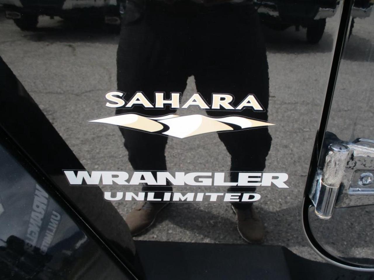 2014 Jeep Wrangler Unlimited Sahara 4WD Photo9