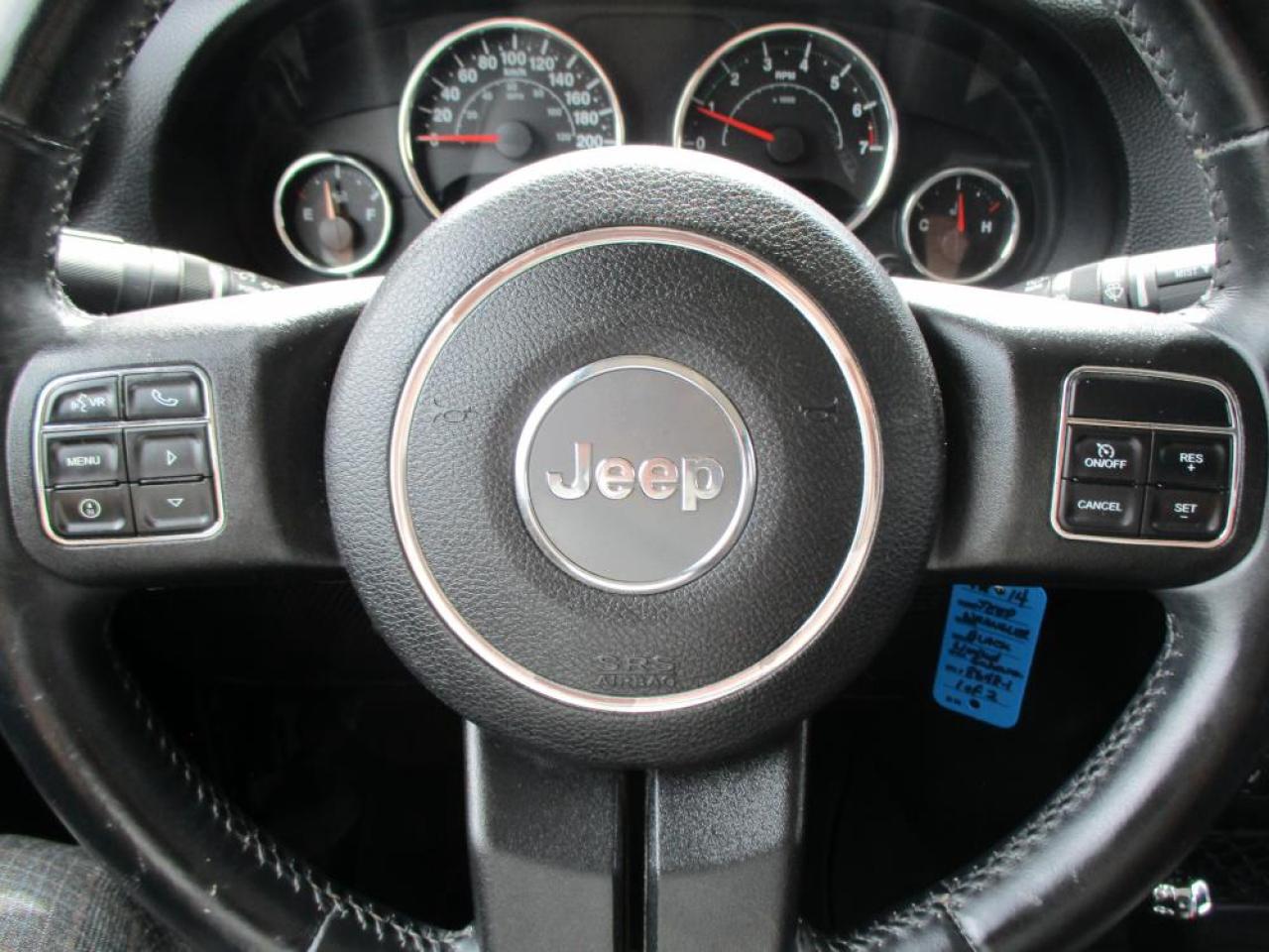 2014 Jeep Wrangler Unlimited Sahara 4WD Photo15
