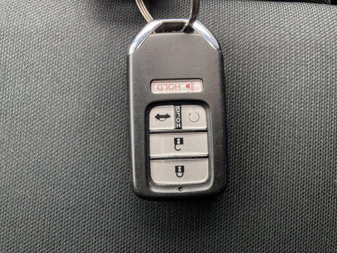 12693216