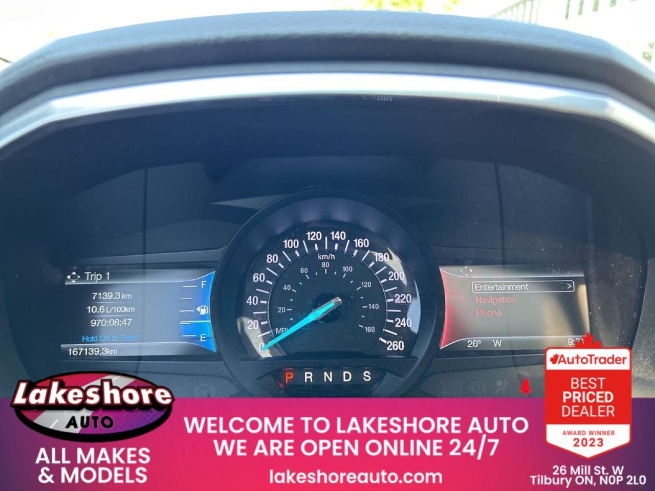 12693765