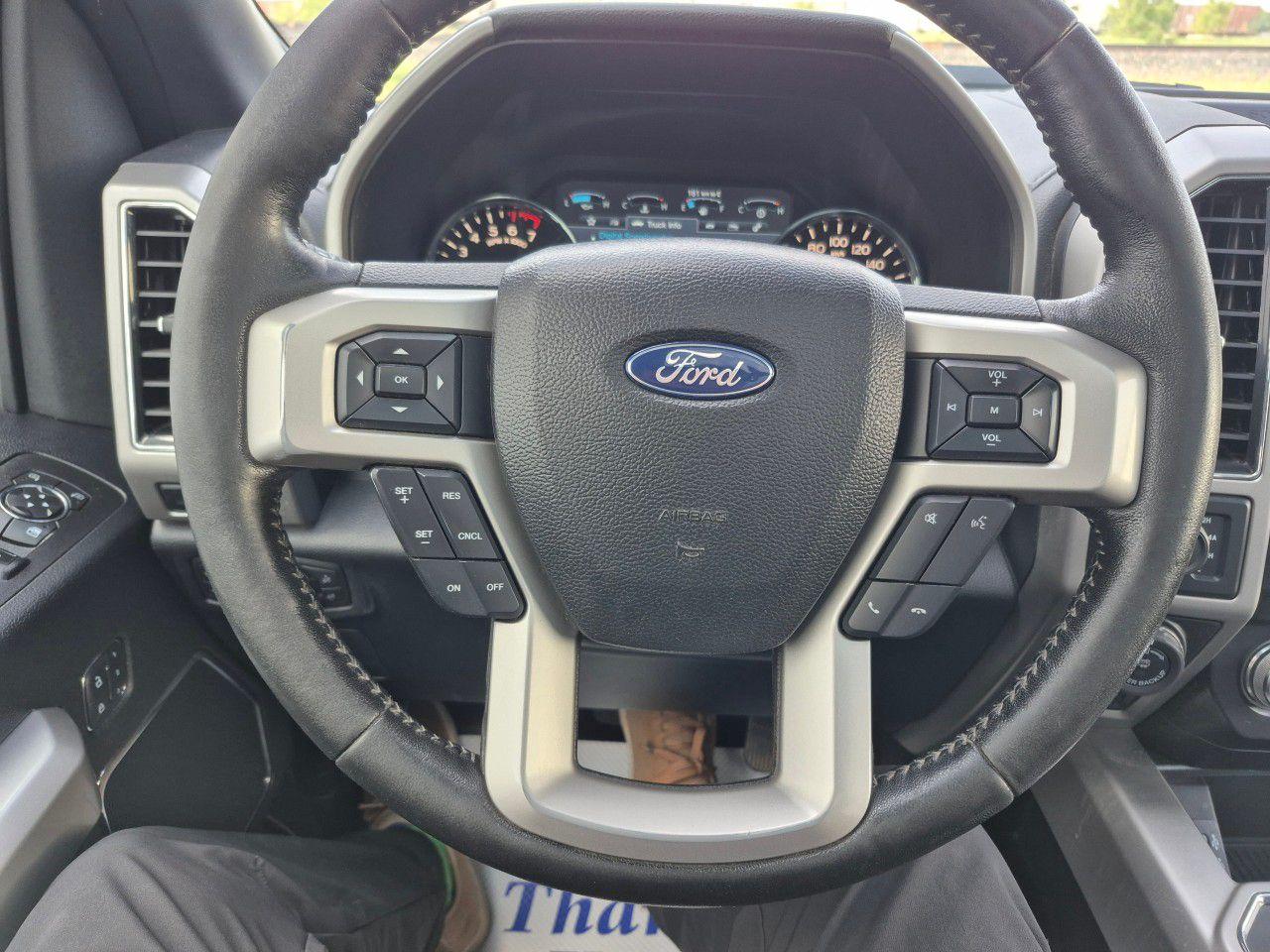 12695763