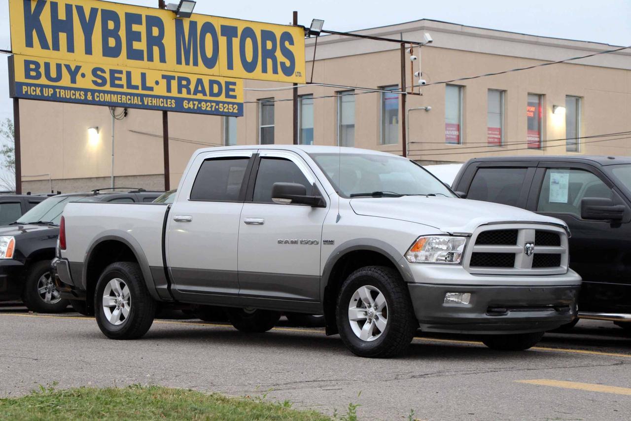 2012 RAM 1500 4WD CREW CAB 140.5" OUTDOORSMAN - Photo #1