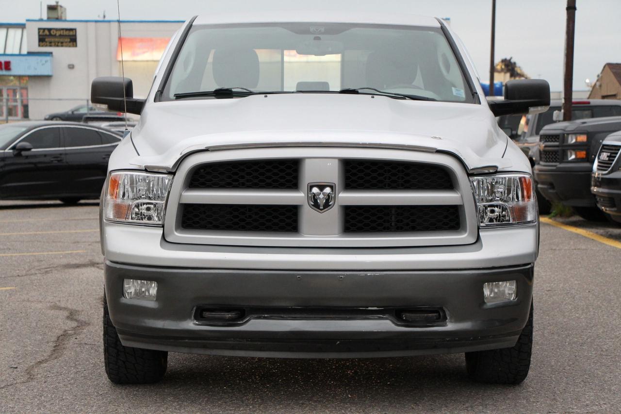 2012 RAM 1500 4WD CREW CAB 140.5" OUTDOORSMAN - Photo #2
