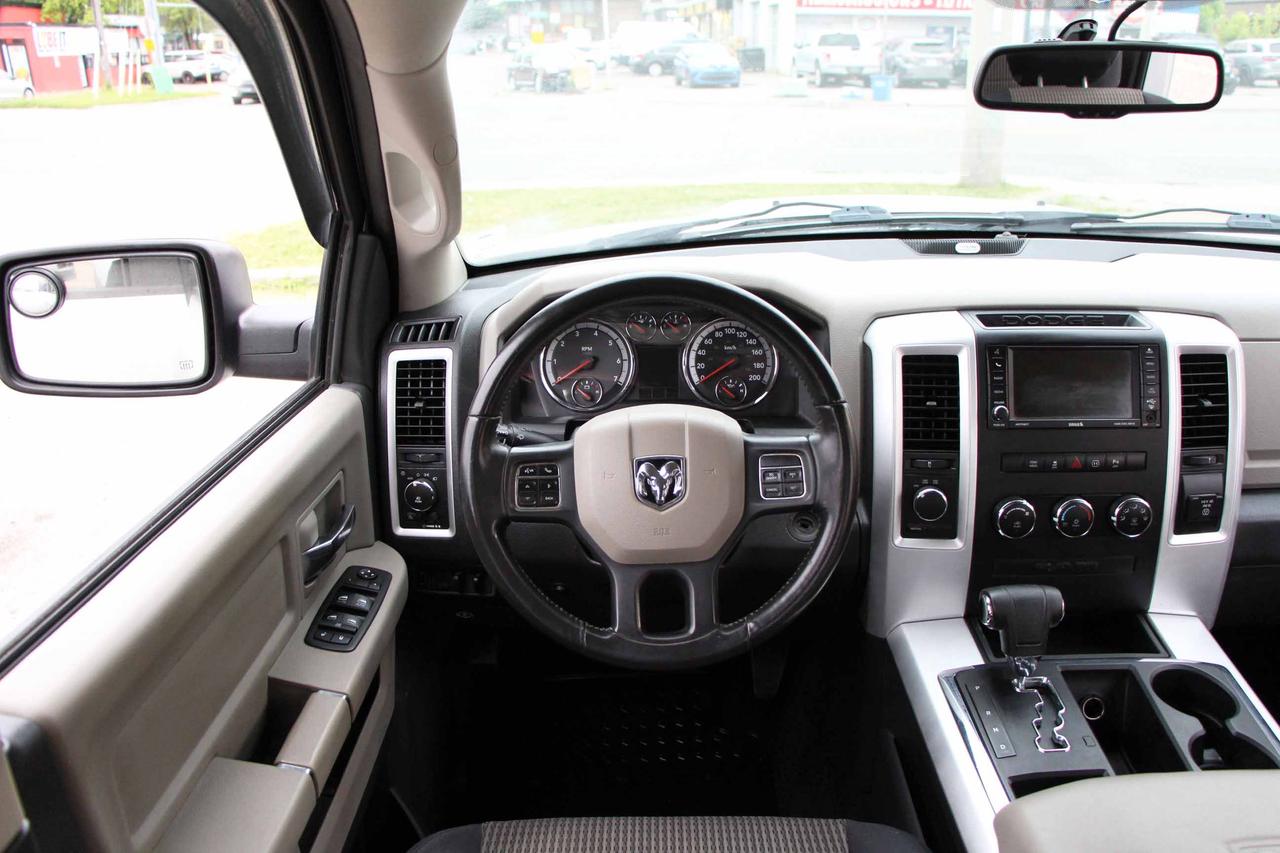 2012 RAM 1500 4WD CREW CAB 140.5" OUTDOORSMAN Photo