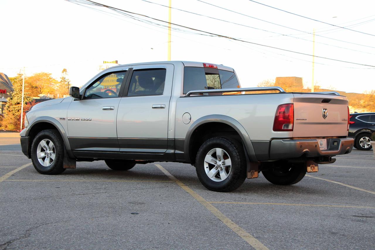 2012 RAM 1500 4WD CREW CAB 140.5" OUTDOORSMAN Photo