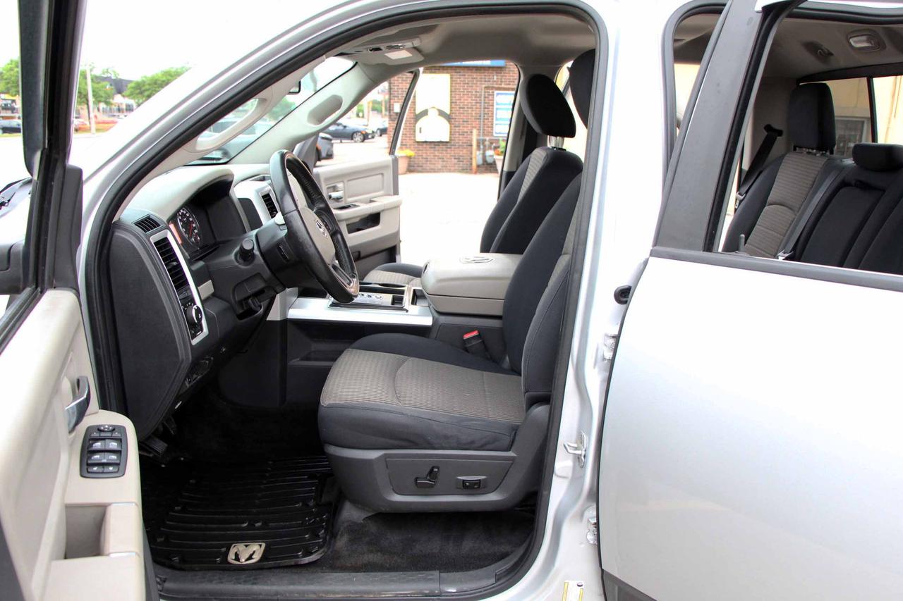 2012 RAM 1500 4WD CREW CAB 140.5" OUTDOORSMAN Photo