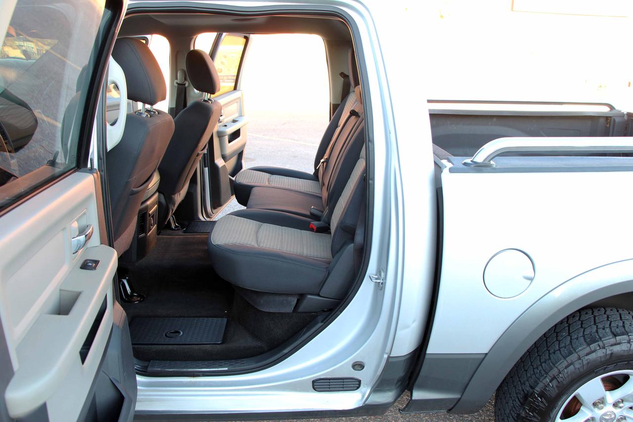 2012 RAM 1500 4WD CREW CAB 140.5" OUTDOORSMAN Photo