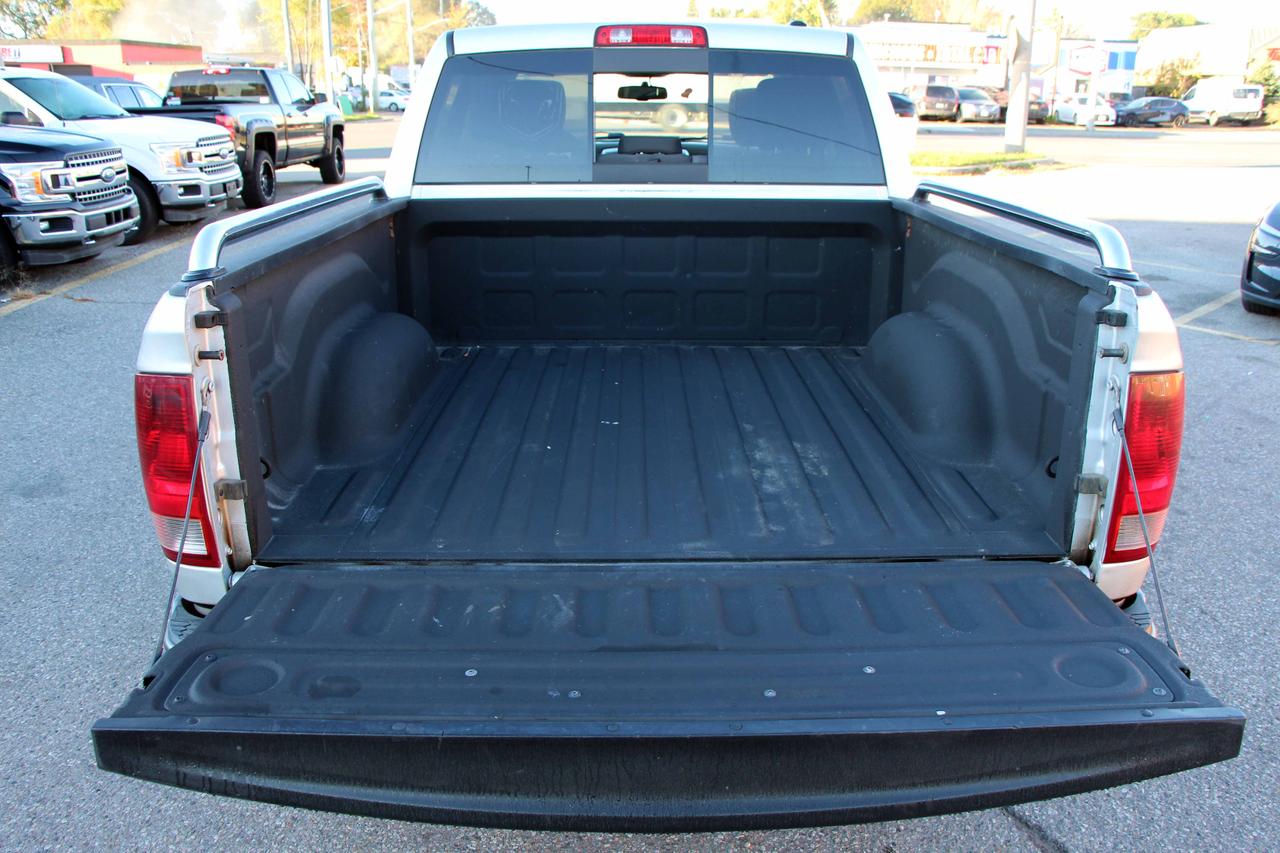 2012 RAM 1500 4WD CREW CAB 140.5" OUTDOORSMAN Photo