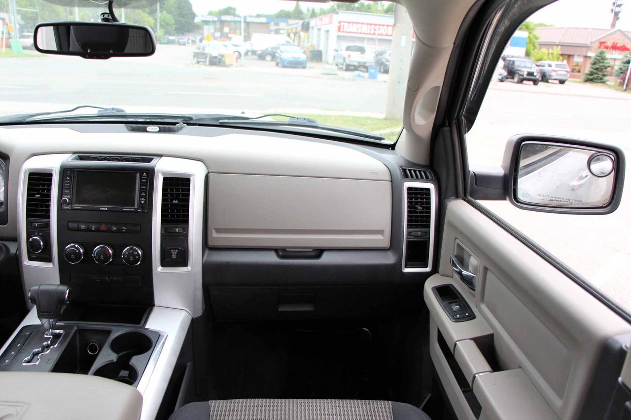 2012 RAM 1500 4WD CREW CAB 140.5" OUTDOORSMAN Photo