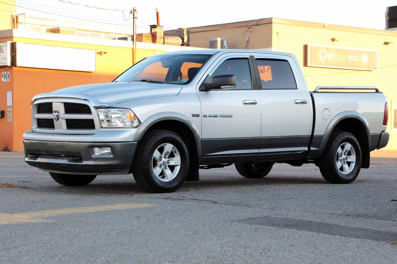 2012 RAM 1500 4WD CREW CAB 140.5" OUTDOORSMAN Photo5