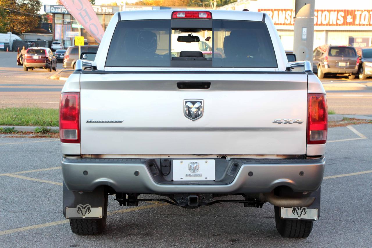 2012 RAM 1500 4WD CREW CAB 140.5" OUTDOORSMAN Photo