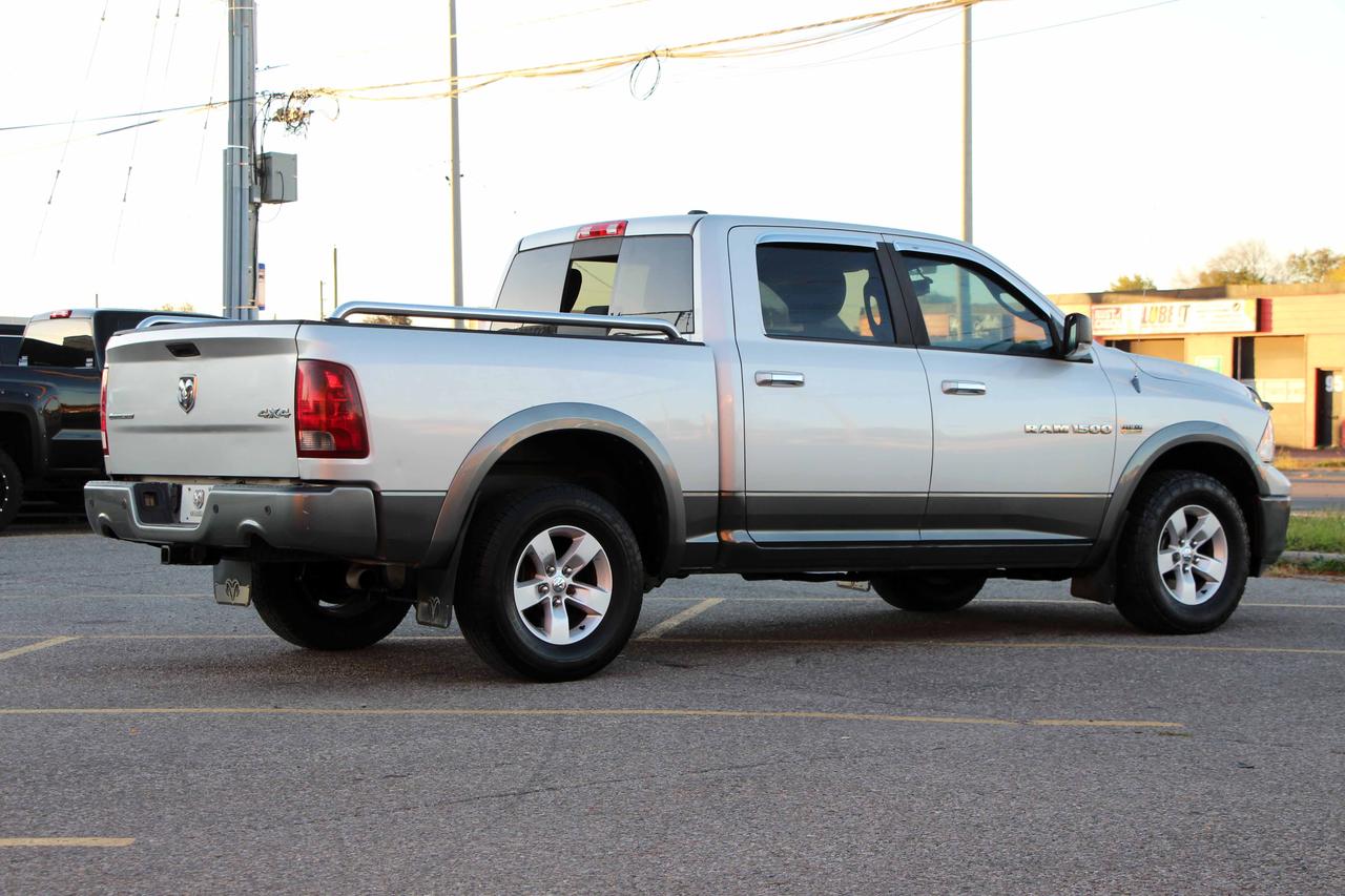 2012 RAM 1500 4WD CREW CAB 140.5" OUTDOORSMAN Photo