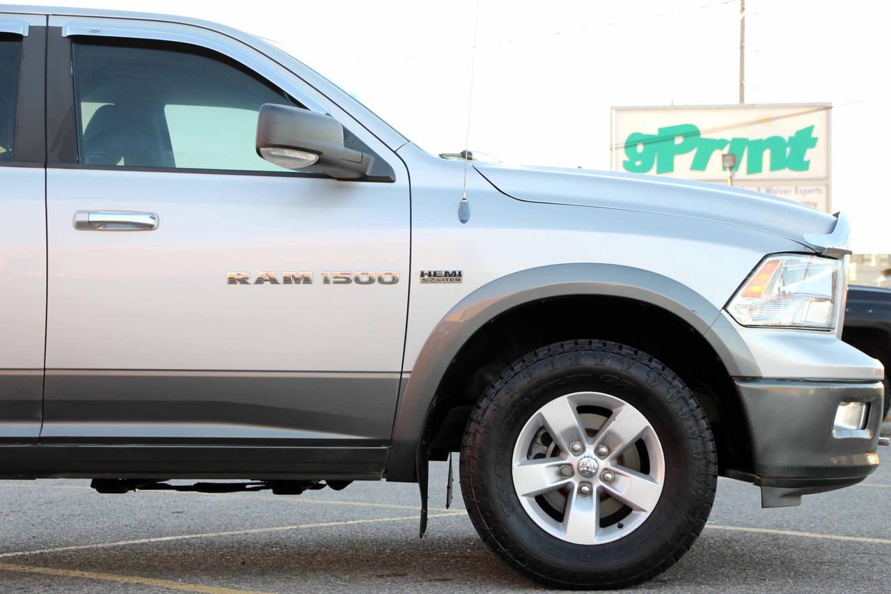 2012 RAM 1500 4WD CREW CAB 140.5" OUTDOORSMAN Photo