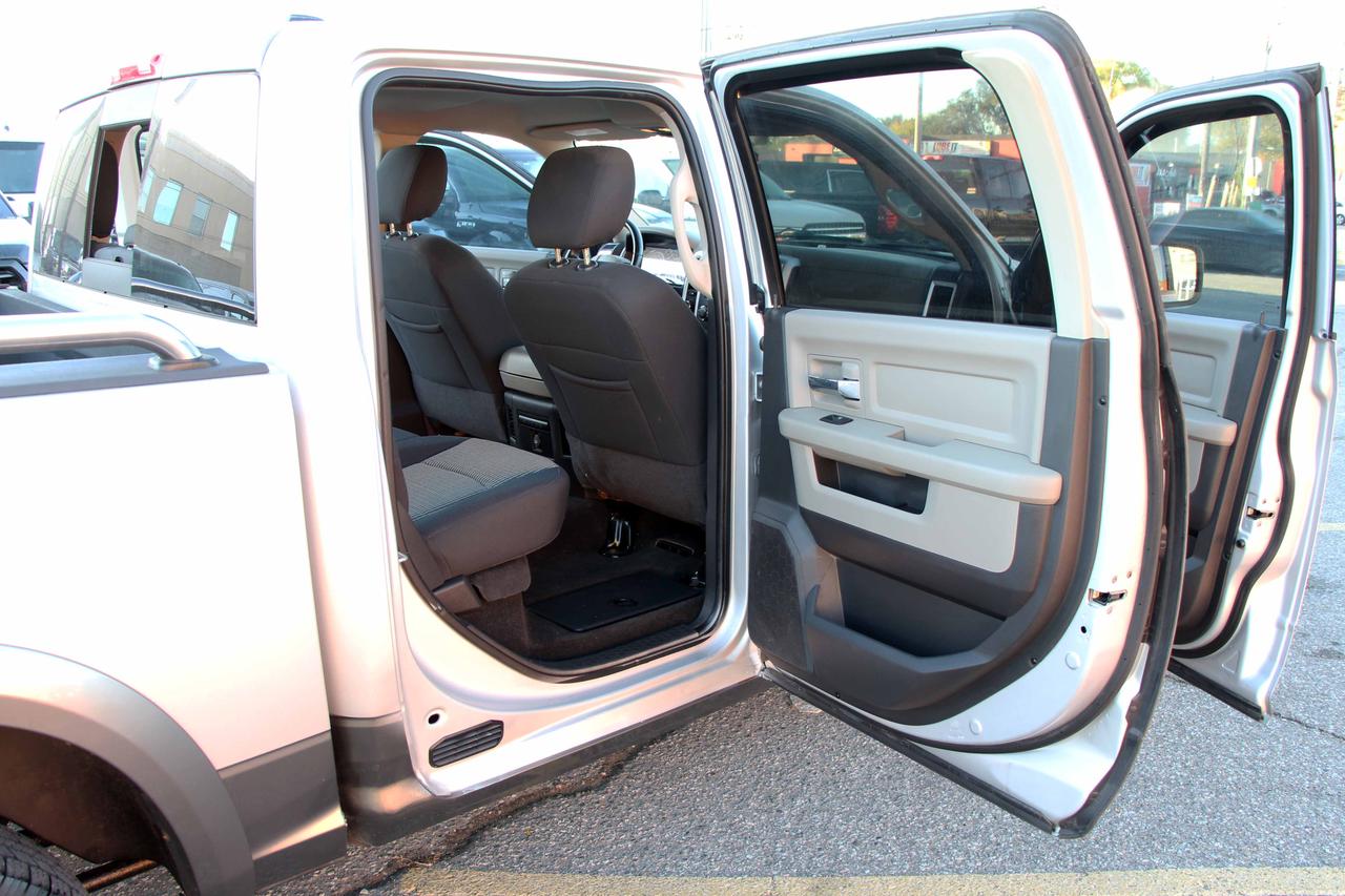 2012 RAM 1500 4WD CREW CAB 140.5" OUTDOORSMAN Photo