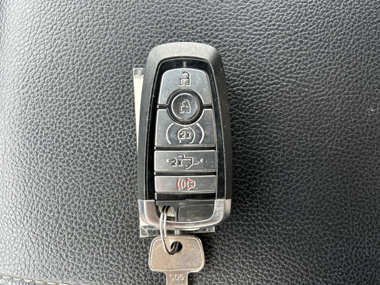 12697593