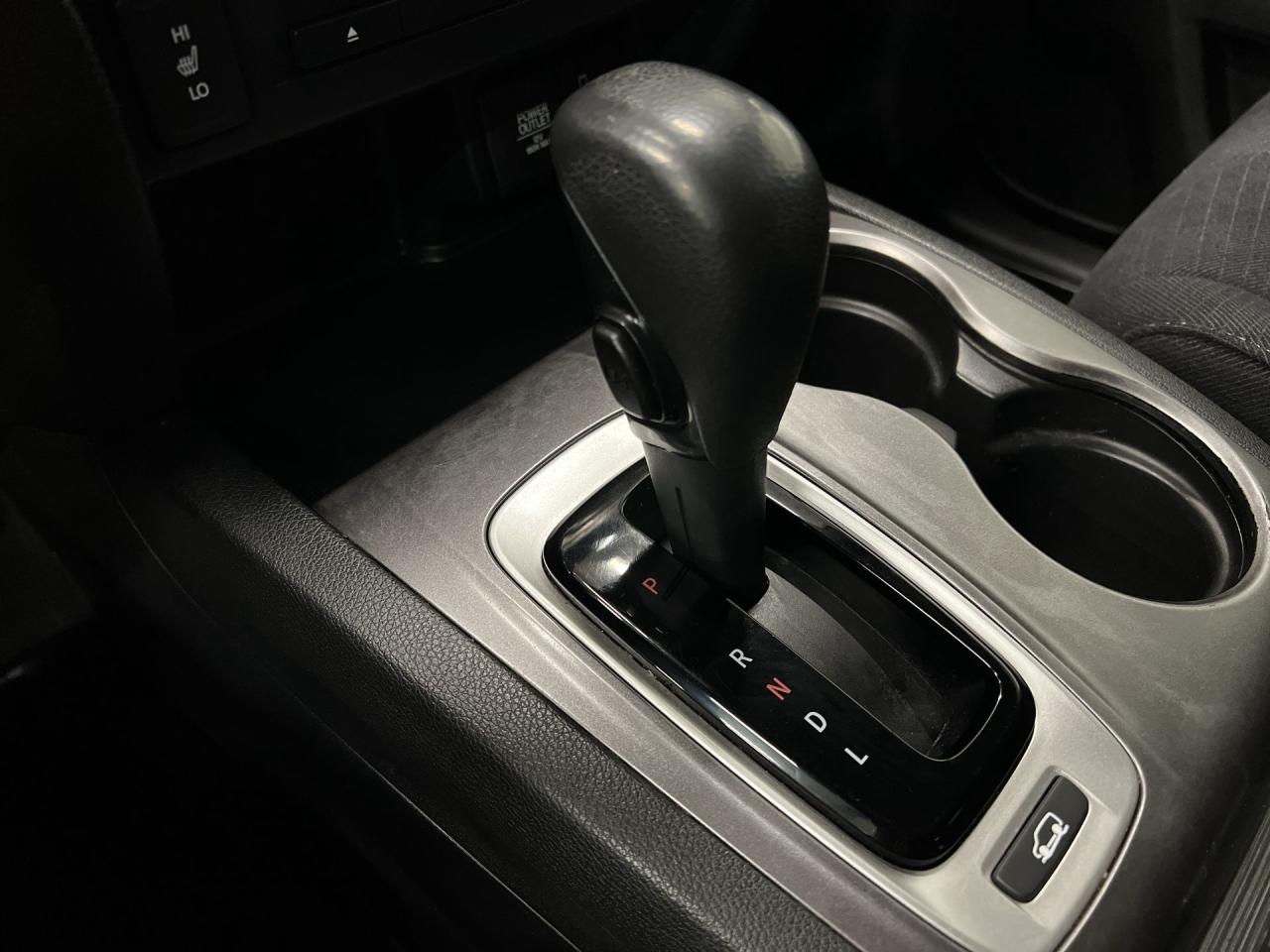 12697596
