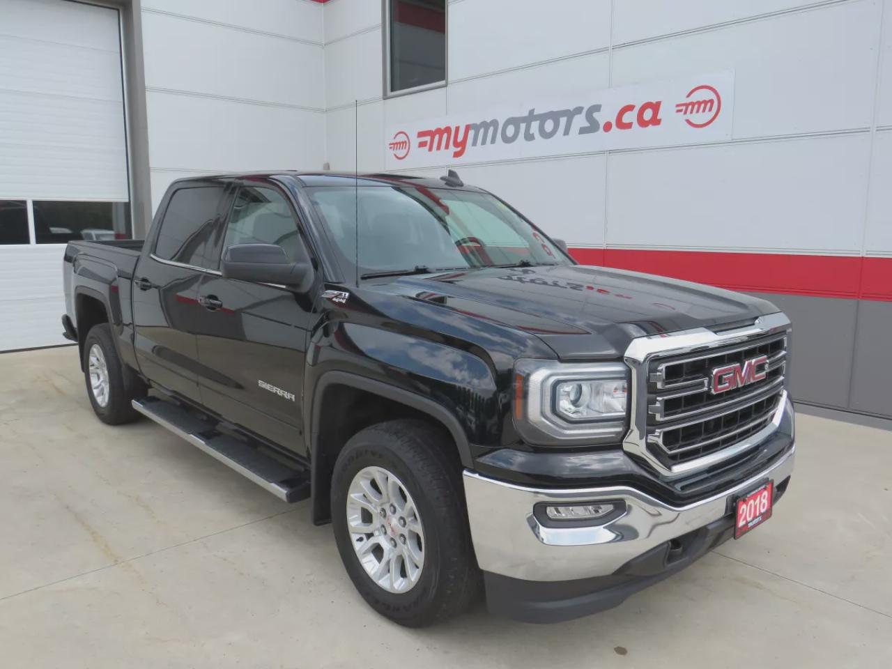 Used 2018 GMC Sierra 1500 SLE (**LOW KM!!**SAFETY/CERTIFIED!!**4WD**RUNNING BOARDS**TRAILER HITCH**FOG LIGHTS**ALLOY RIMS**POWER SEATS**LEATHER WRAPPED STEERING WHEEL**HEATED SEATS**DIGITAL TOUCHSCREEN**REVERSE CAMERA**DUAL CLIMATE CONTROL**BLUETOOTH**CRUISE CONTROL**) for sale in Tillsonburg, ON