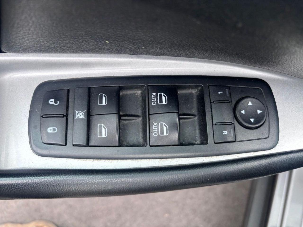 12697740