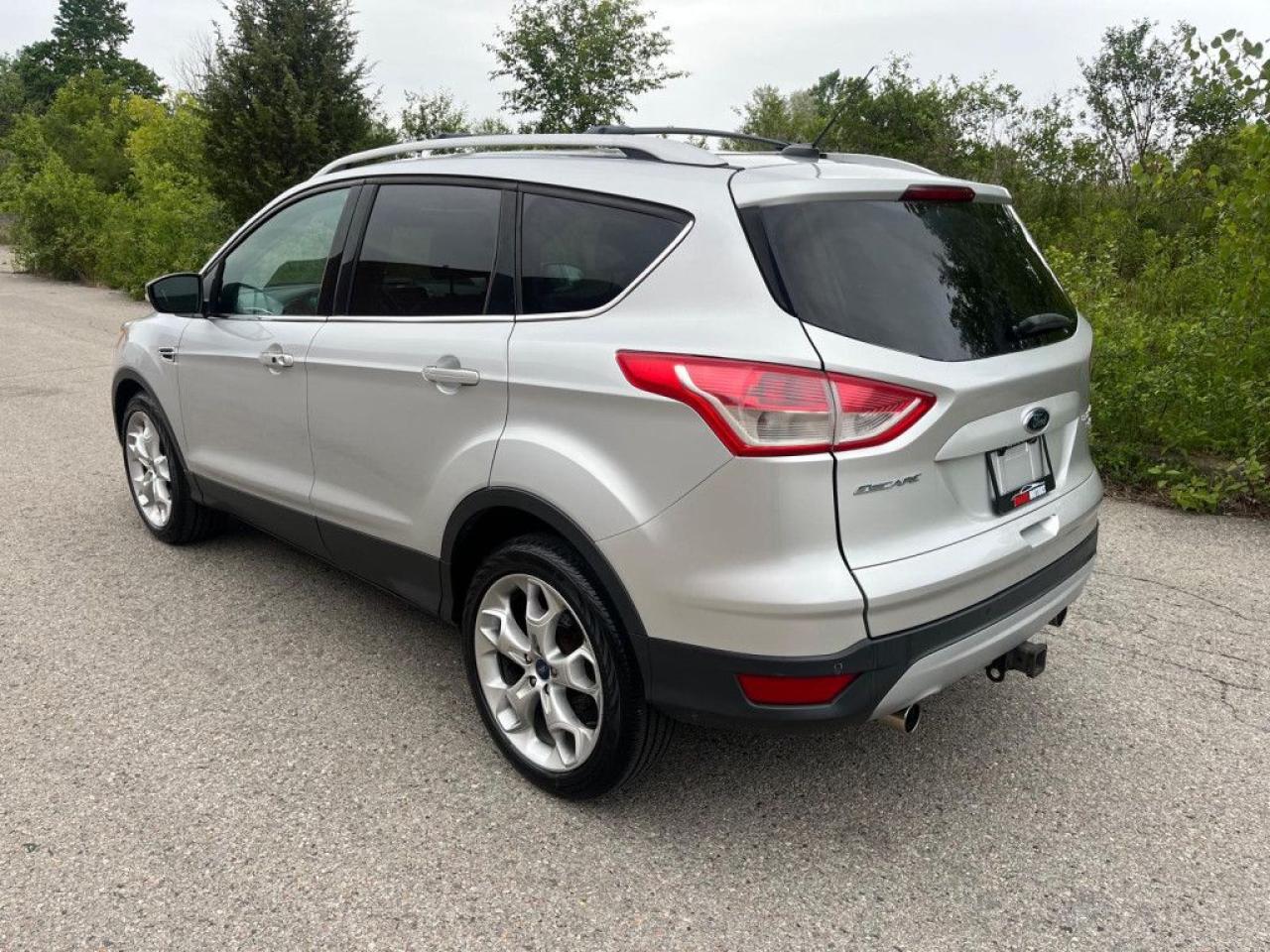 2013 Ford Escape TITANIUM |4WD|TOP OF THE LINE|PANO ROOF|BACK-UP CAM|NAVI|REMOTE STARTER| - Photo #4