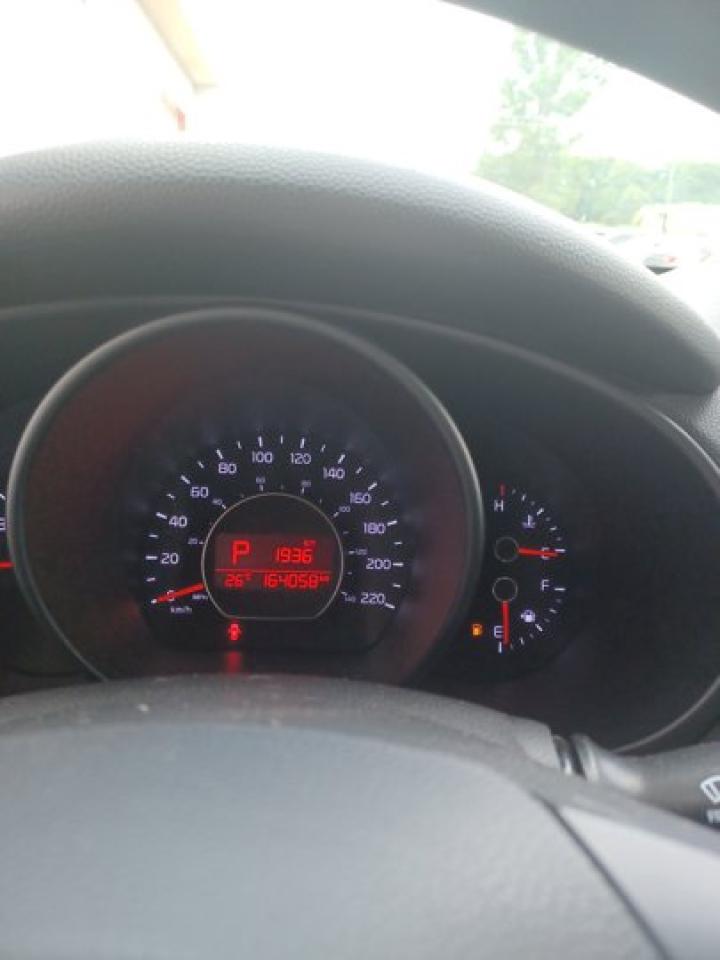 12698280