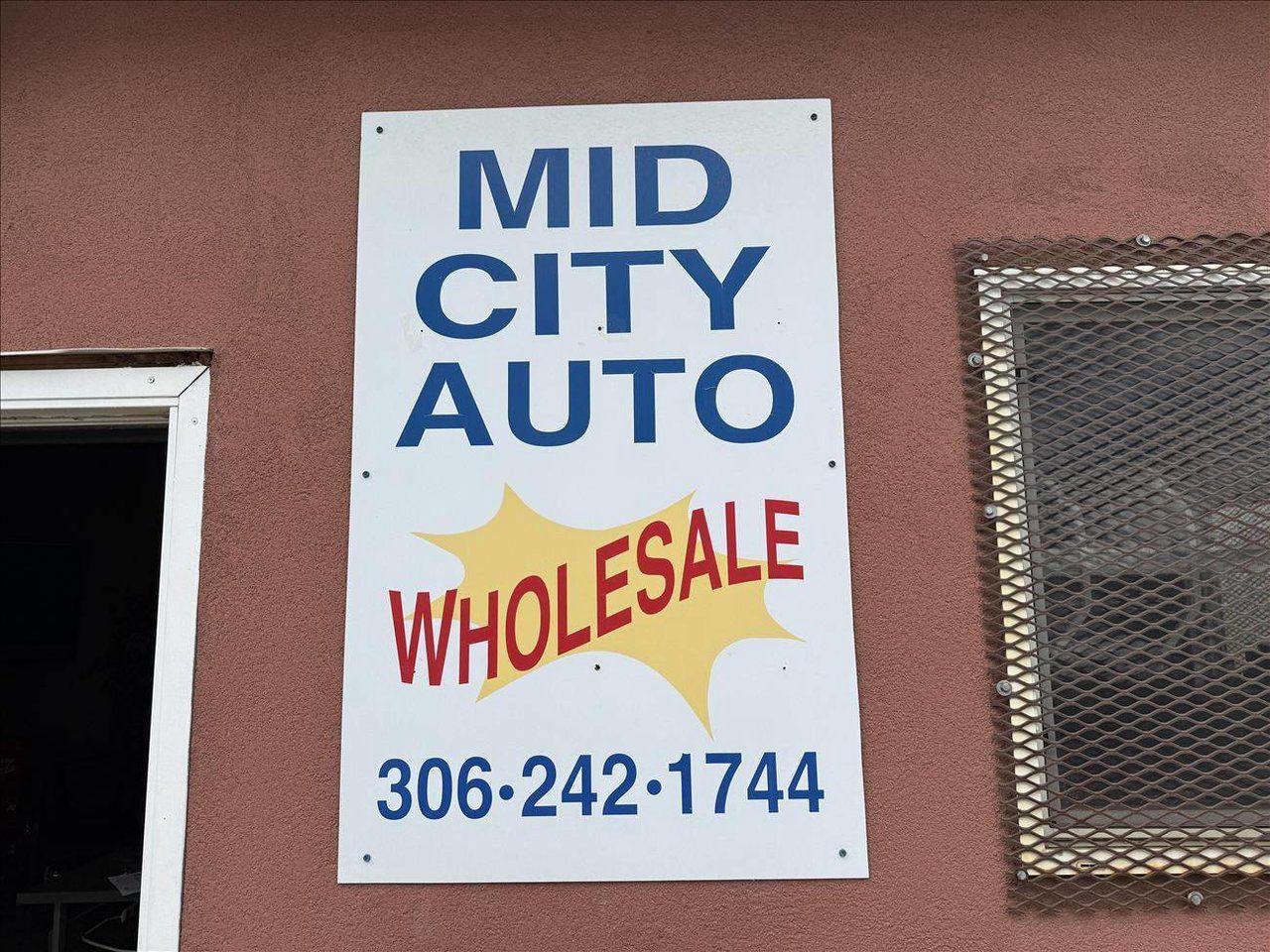 12698604