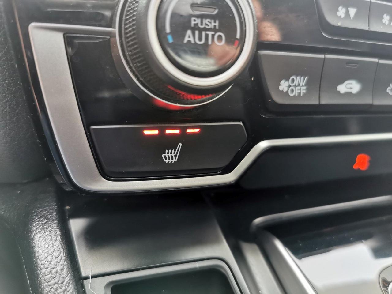 12698733