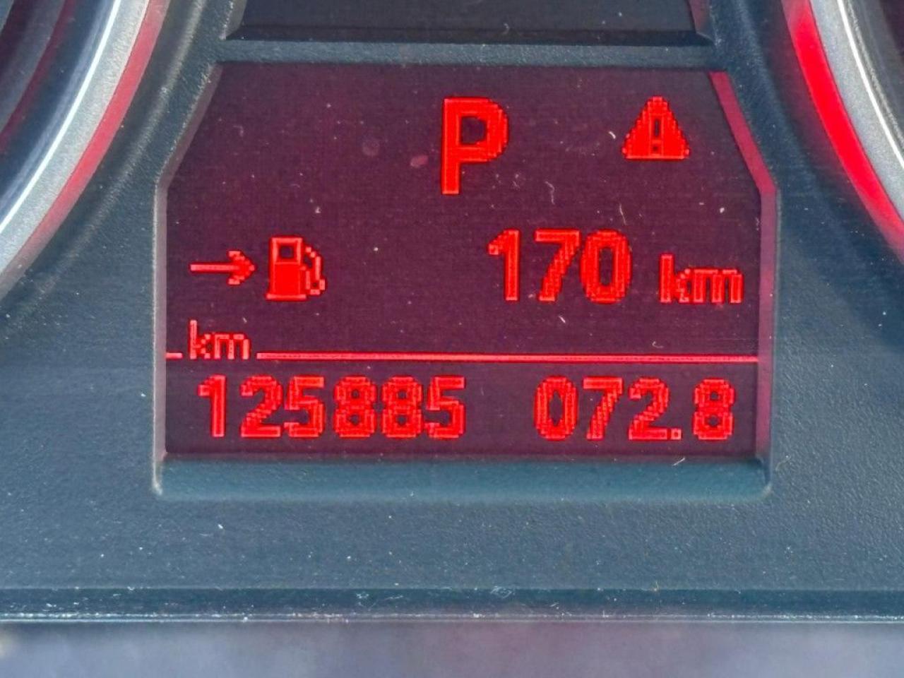 12701208