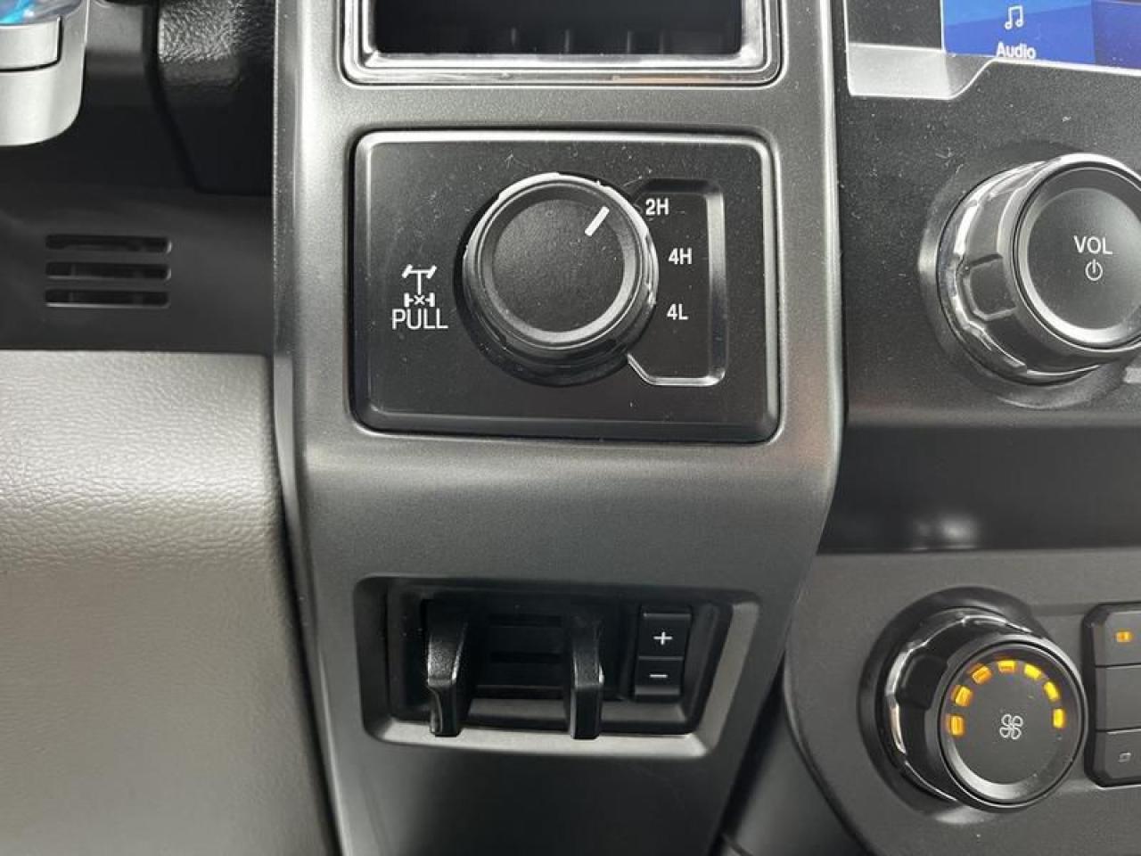 12701340