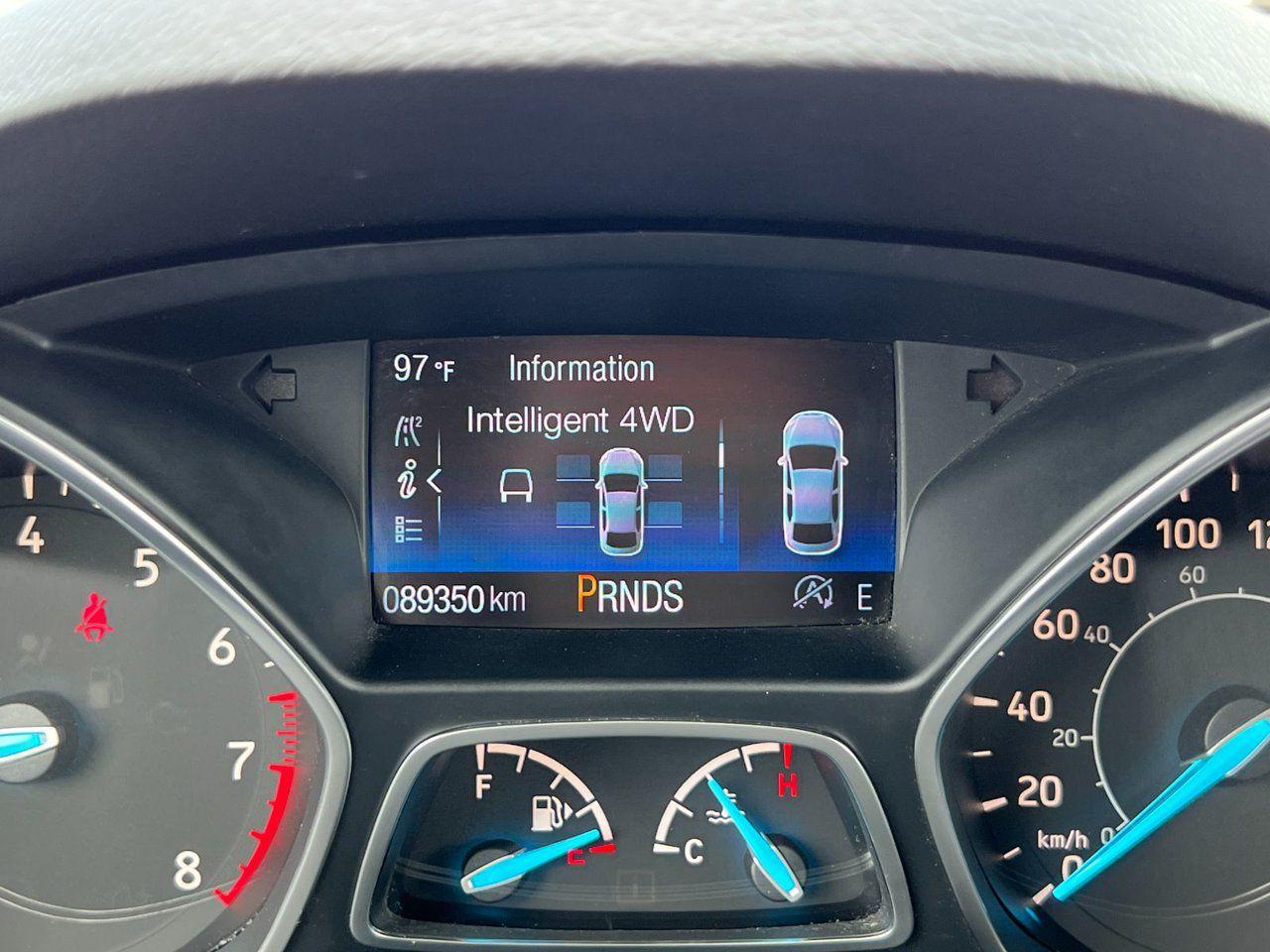 12701367