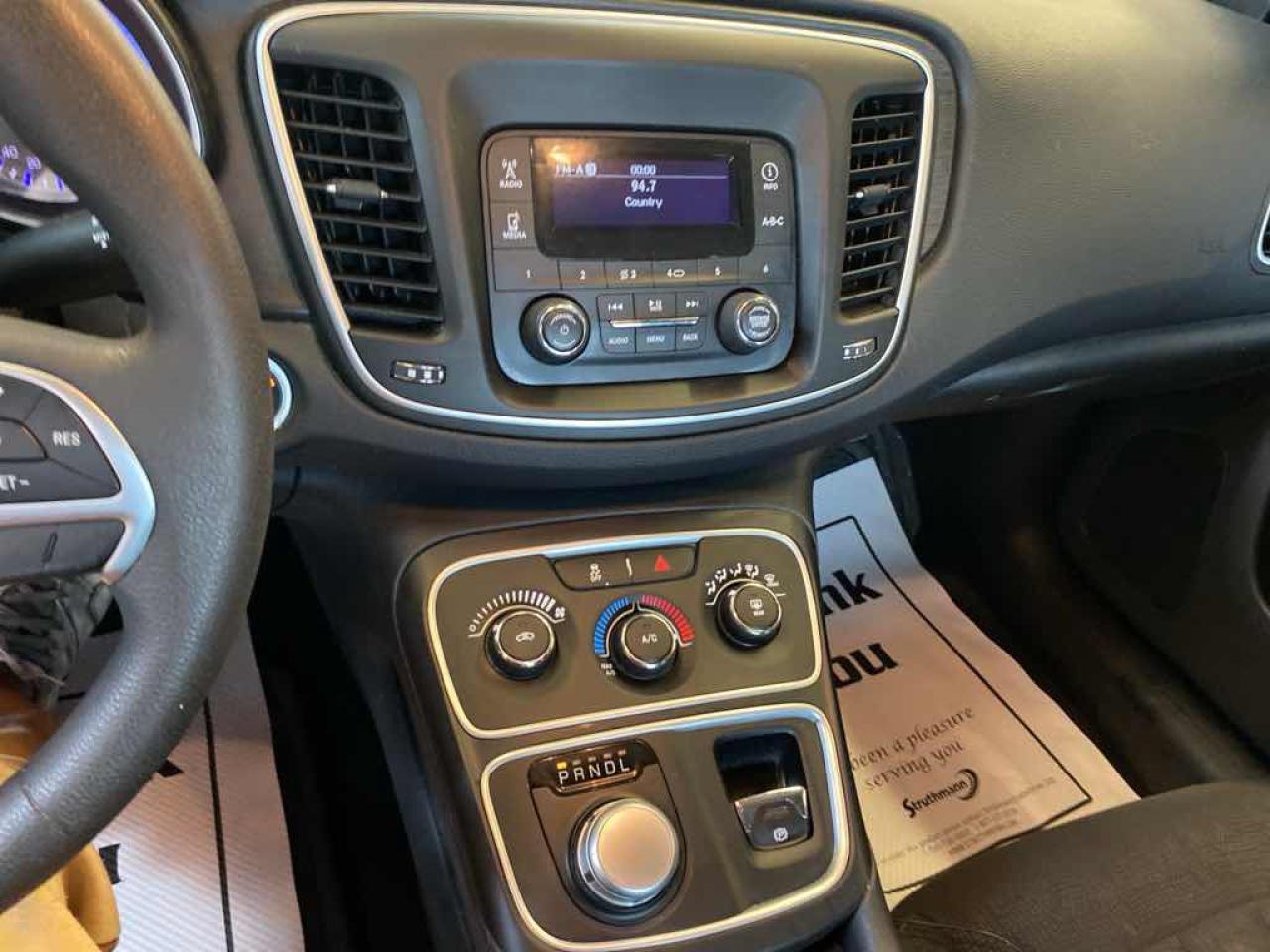 12703743