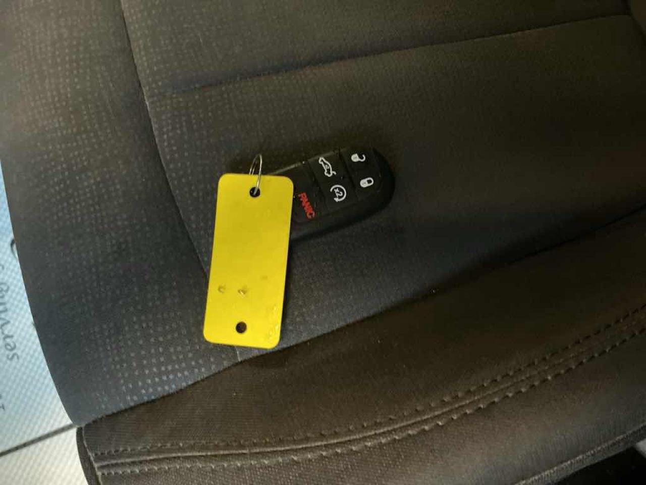12703743