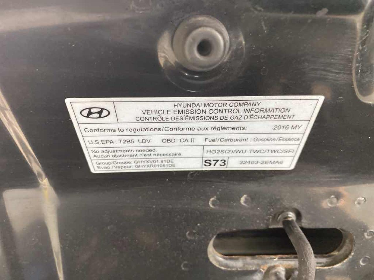 12703749