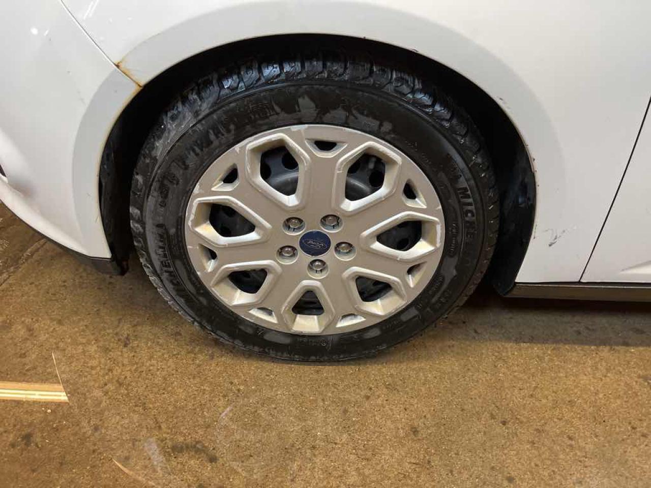 12703767
