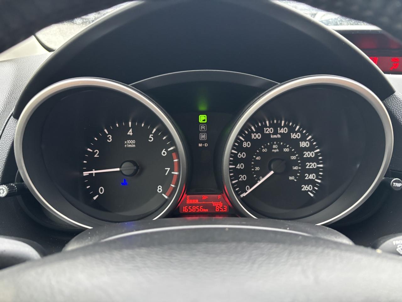 12703857