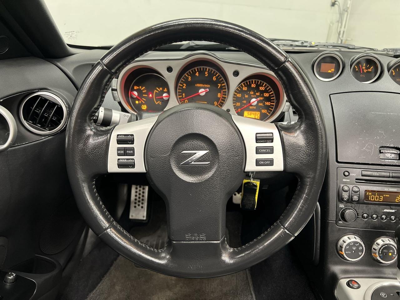 12704997