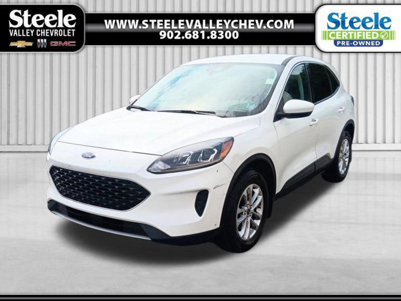 Value Market Pricing, AWD, 4-Wheel Disc Brakes, 6 Speakers, 6-Way Manual Driver Seat, Air Conditioning, Alloy wheels, Auto High-beam Headlights, Brake assist, Dual front impact airbags, Dual front side impact airbags, Emergency communication system: SYNC 3 911 Assist, Four wheel independent suspension, Front anti-roll bar, Front Bucket Seats, Front reading lights, Fully automatic headlights, Heated front seats, Heated Unique Cloth Front Bucket Seats, Illuminated entry, Knee airbag, Lane Departure Warning System, Low tire pressure warning, Occupant sensing airbag, Overhead airbag, Power door mirrors, Power steering, Power windows, Radio: AM/FM Stereo w/SiriusXM, Rear anti-roll bar, Rear reading lights, Rear window defroster, Rear window wiper, Remote keyless entry, Speed control, Speed-sensing steering, Speed-Sensitive Wipers, Split folding rear seat, Spoiler, Steering wheel mounted audio controls, SYNC 3 Communications & Entertainment System, SYNC 3/Apple CarPlay/Android Auto, Telescoping steering wheel, Tilt steering wheel, Traction control, Wheels: 17 Shadow Silver-Painted Aluminum.Recent Arrival! Odometer is 10895 kilometers below market average! White Metallic 2021 Ford Escape SE Steele Certified AWD 8-Speed Automatic 1.5L EcoBoost Come see why were Annapolis Valleys go-to GM dealer for the best used vehicle deals! We dont inflate our prices ever. Instead, we use cutting-edge live market software to price our vehicles fairly and competitively, so you get the best deal upfront with no guesswork. Want proof? Just ask for a Market Pricing Report on any of our used vehicles well show you exactly how our pricing stacks up. No games, just great cars at great prices. Stop by today and lets get you behind the wheel of your next ride!Certified. Certification Program Details: 85 Point Inspection Fresh Oil Change 2 Years MVI Full Tank Of Gas Full Vehicle DetailAt Steele Valley Chevrolet Buick GMC, we go the extra mile to ensure you drive away with confidence. Every used vehicle on our lot undergoes a rigorous reconditioning process and comes with a detailed vehicle history report, giving you full transparency and peace of mind. We believe everyone deserves a reliable vehicle, which is why we offer flexible financing solutions tailored to fit any budget or credit situation. When you shop with us, youre choosing quality, trust, and a seamless car-buying experience. Find your next vehicle today at Steele Valley Chevrolet Buick GMC you deserve the best!