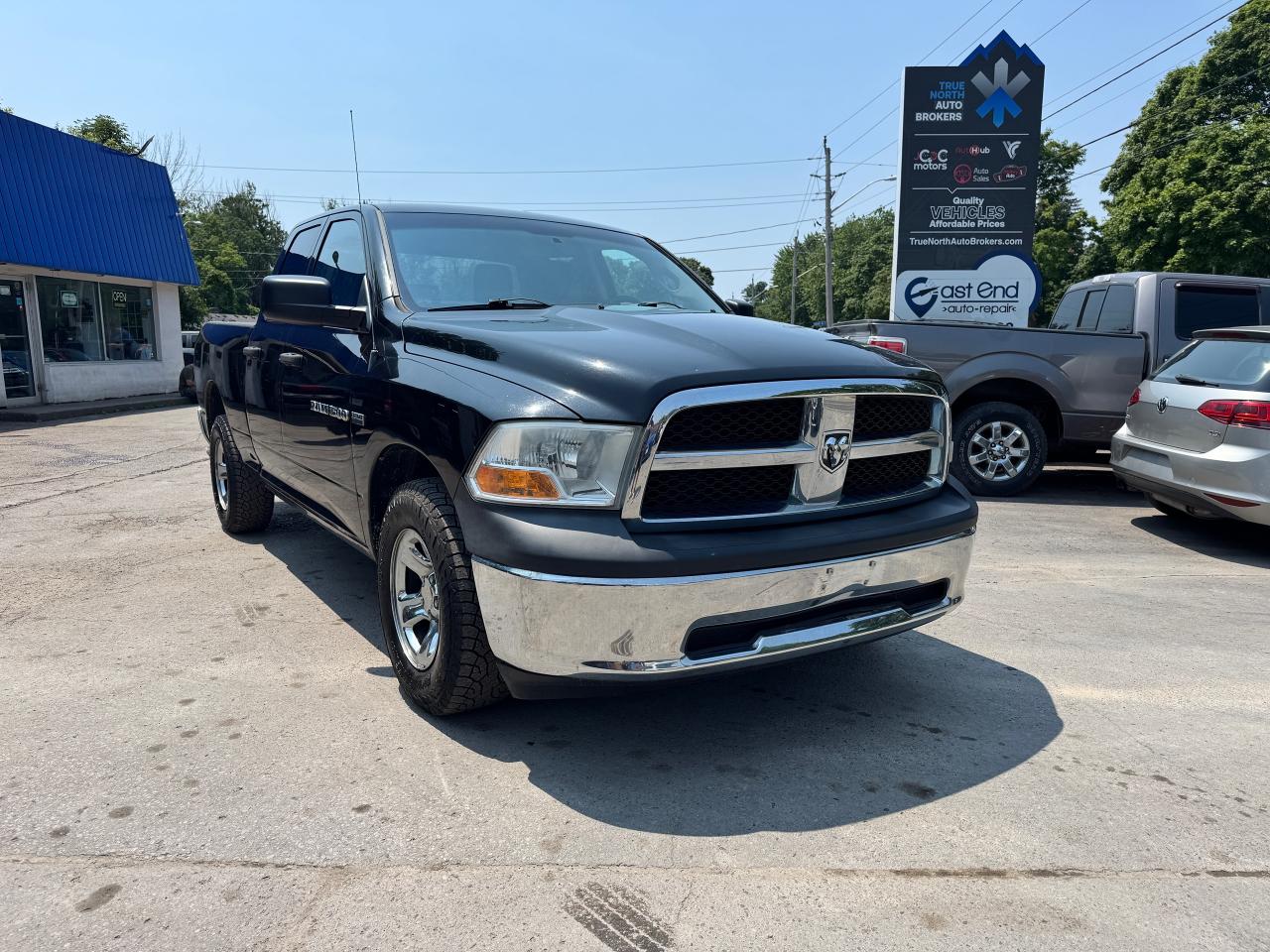 Used 2011 RAM 1500 4WD QUAD CAB 140.5